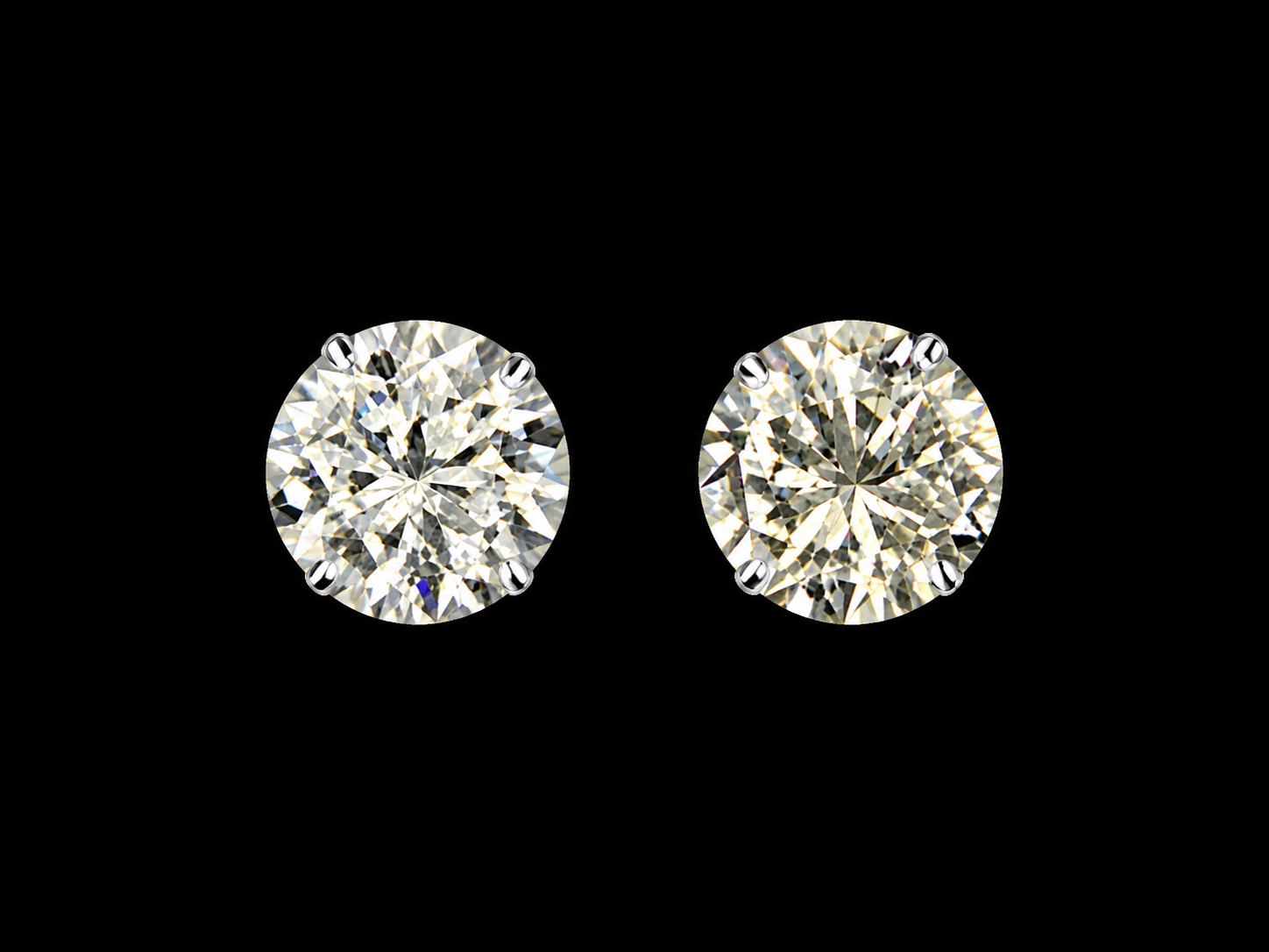 BO OR GRIS 750/00 1.00g 2 DIAMANTS RONDS 0.50CT SERTIS 4 GRIFFES