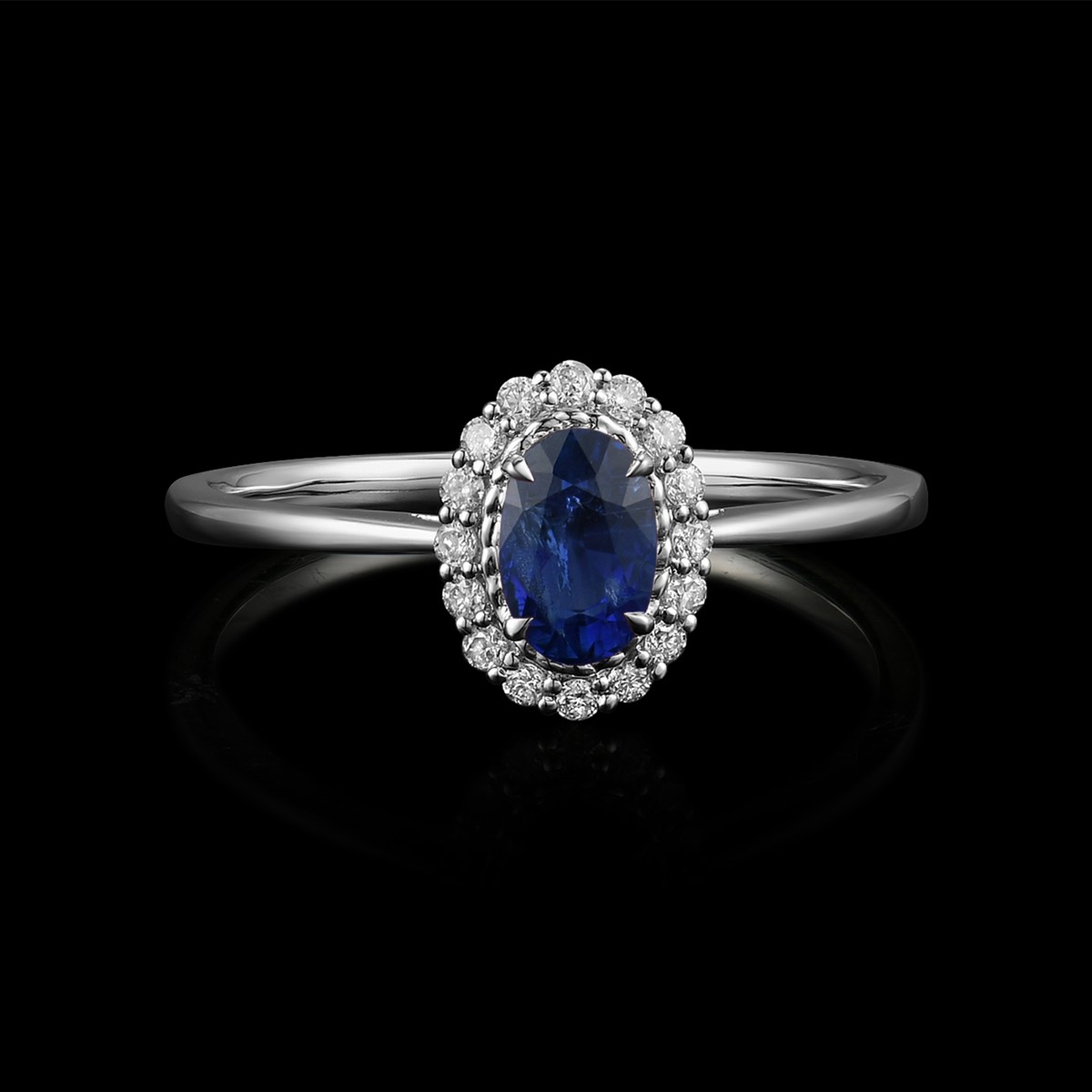 BAGUE OR GRIS 750/00 1.57g 1 SAPHIR OVALE 0.59CT 16 DIAMANTS RONDS 0.11CT