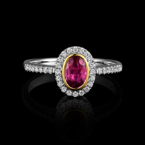BAGUE OR GRIS / OR JAUNE 750/00 3.55g 1 RUBIS OVALE 0.54CT 34 DIAMANTS RONDS 0.24CT