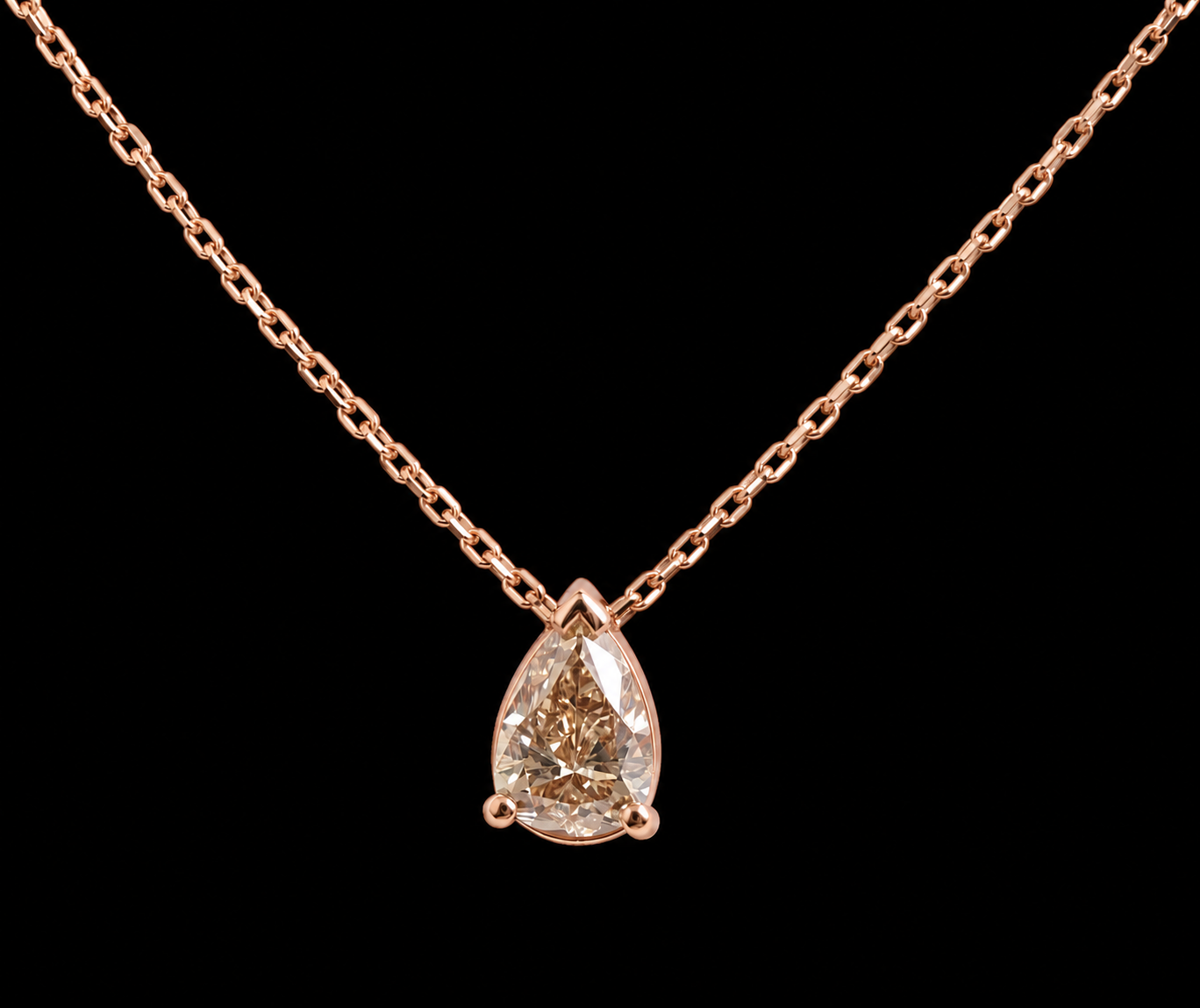COLLIER OR ROSE 750/00 1.93g 1 DIAMANT POIRE DE COULEUR 0.69CT SERTI GRIFFES