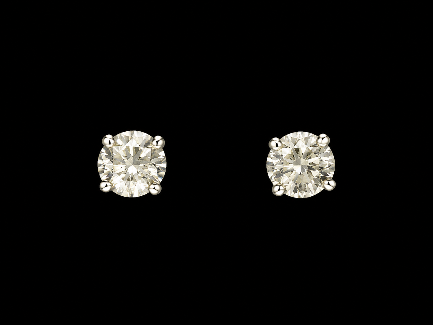 BO OR JAUNE 750/00 1.00g 2 DIAMANTS RONDS 0.50CT SERTIS 4 GRIFFES