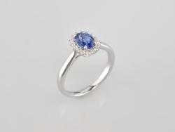 BAGUE OR GRIS 750/00 3.42g SAPHIR 0.85CT 16 DIAMANTS 0.18CT T54