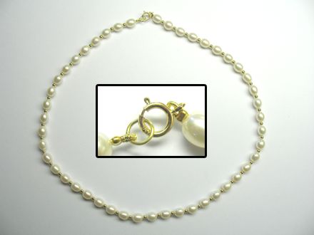 COLLIER OR JAUNE 750/00 0.90g EAU DOUCE CHINE 5,5/6MM GRAIN DE RIZ BLANCHE