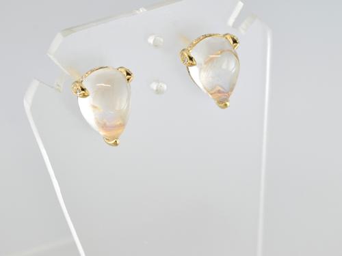 BO OR JAUNE 750/00 2 MOONSTONE DIAMANT CMN3.87(2) D0.25(40) G2.27