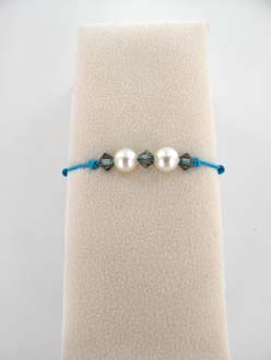 BRACELET EAU DOUCE CHINE 5,5/6MM SEMI-RONDE BLANCHE 3 CRISTAL NOIR