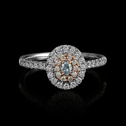 BAGUE OR GRIS / OR ROSE 750/00 2.80g 1 DIAMANT BLEU OVALE  0.14CT 40 DIAMANTS RONDS 0.43CT