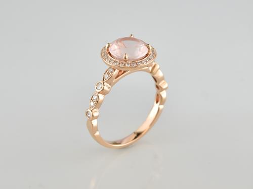 BAGUE OR ROSE 750/00 BAGUE OR ROSE 750/00 3.42g 1 QUARTZ ROSE 2.07 38 DIAMANT 0.27